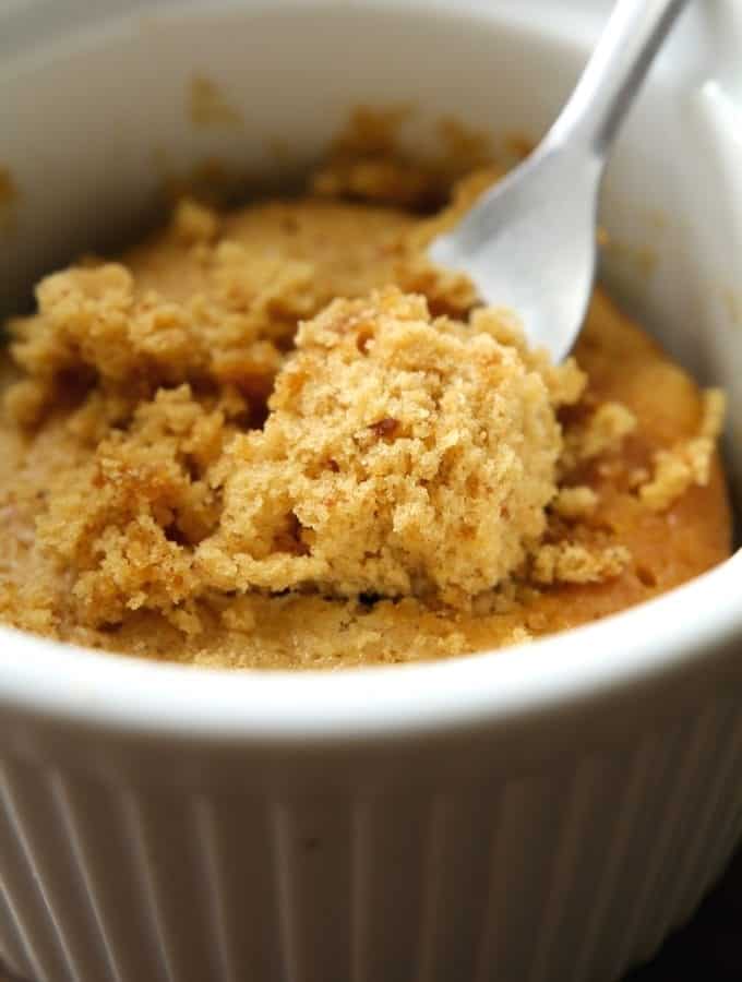 A low carb keto peanut butter mug cake in a mug.