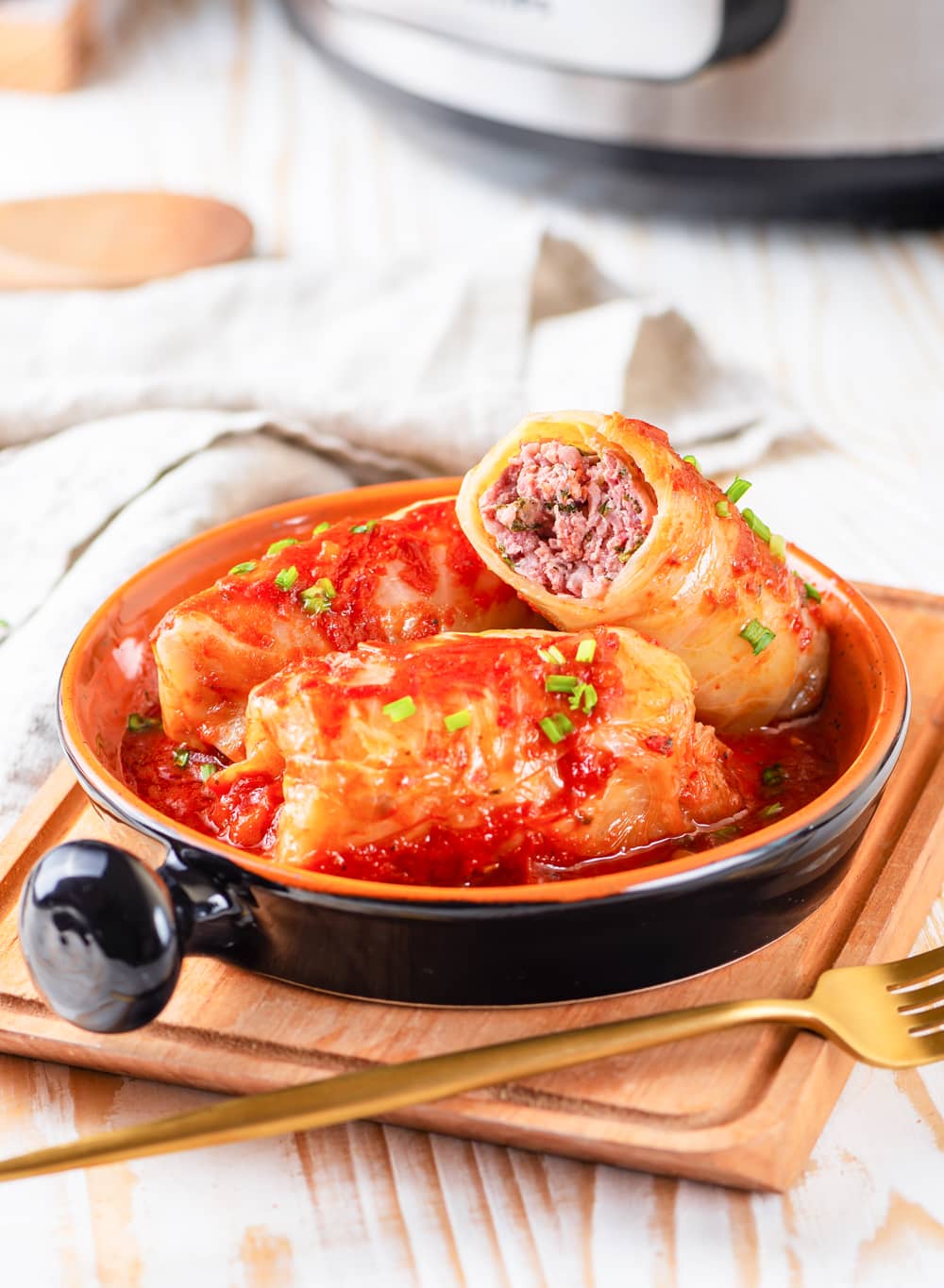 3 Keto cabbage rolls in a small dish.