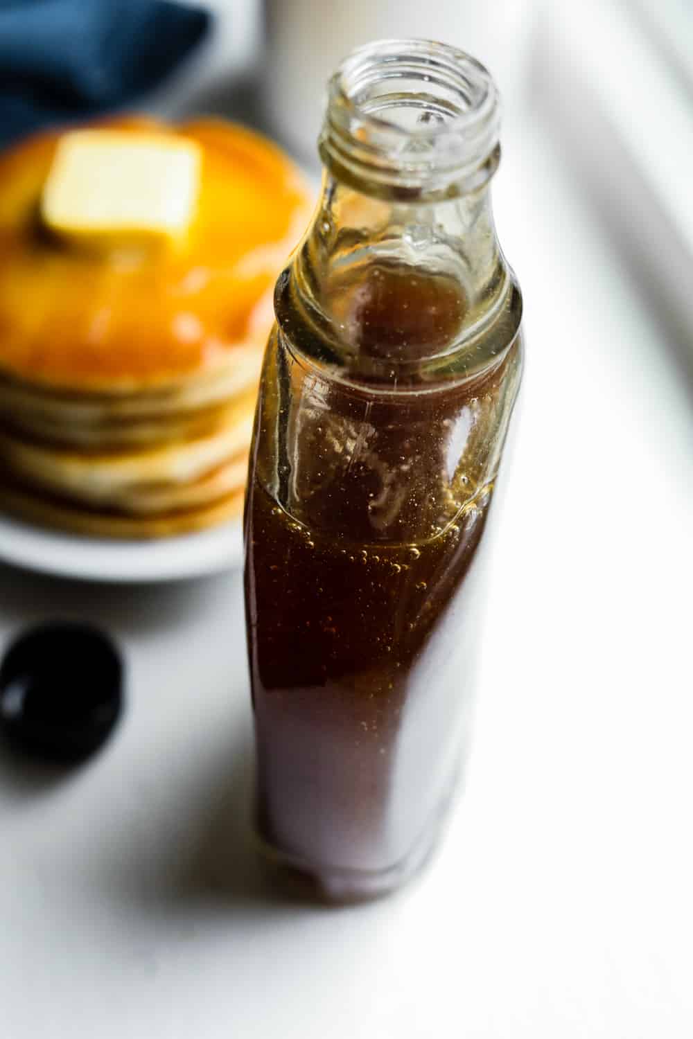 The side of a bottle of maple syrup.
