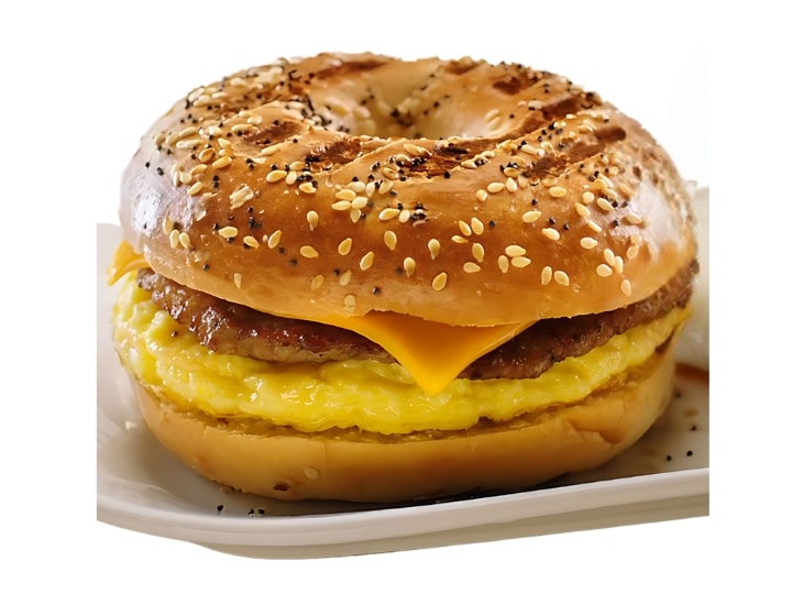 An image of a Tim Hortons sausage everything bagel breakfast sandwich on a white background.