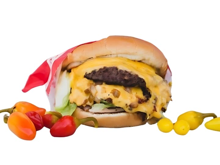 An image of the In N Out cheeseburger with chilis on a white background.