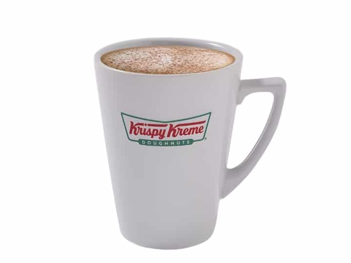 An image of a cappuccino from Krispy Kreme in a ceramic mug on a white background.