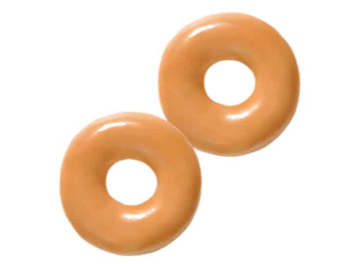 An image of two mini original glazed doughnuts from Krispy Kreme on a white background.