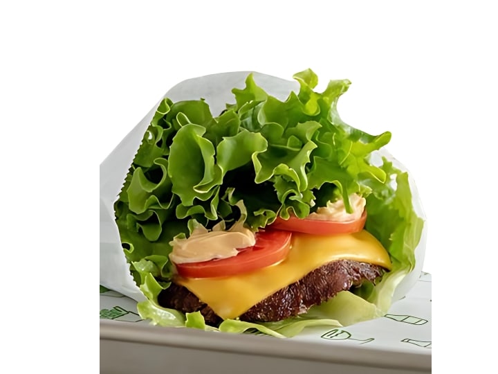 An image of a Shake Shack shack burger lettuce wrap on a white background.