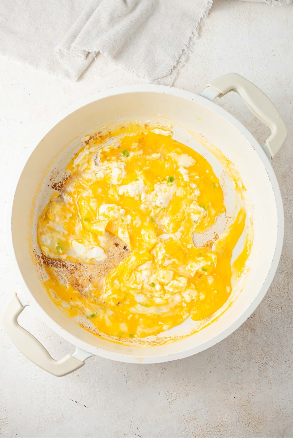 Cottage cheese omelet cooking in a pot.